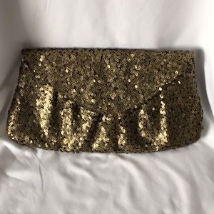 Black and gold sequin clutch